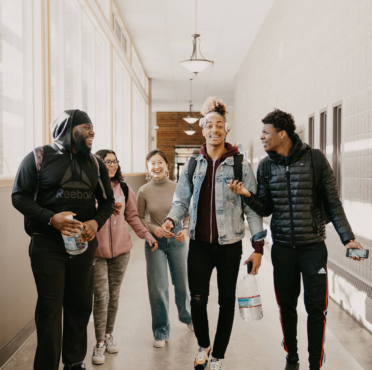 Students walking down a hallway