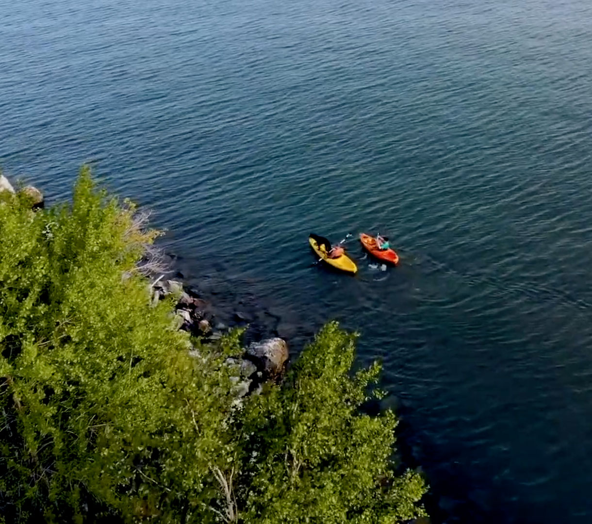 Students canoeing on the water